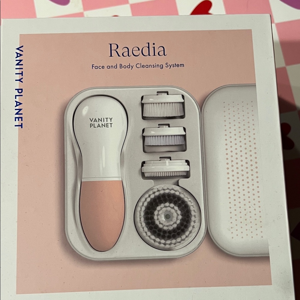 Brand new. Never opened. Vanity Planet Raedia Cleansing System - White and Pink